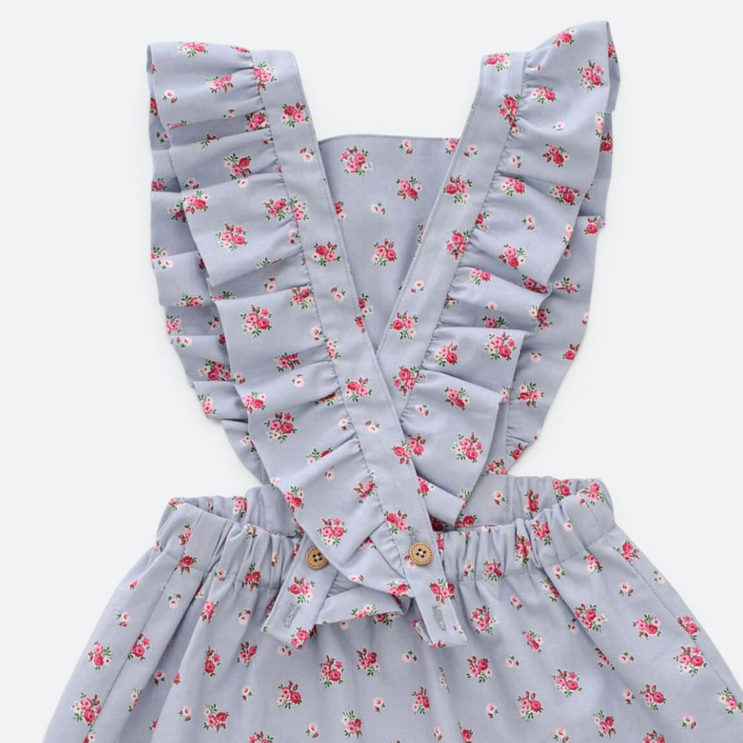 Latzkleid PDF Schnittmuster LIVIA – Rüschenkleid mit Trägern 68/74–116/122 in floral design with ruffles.