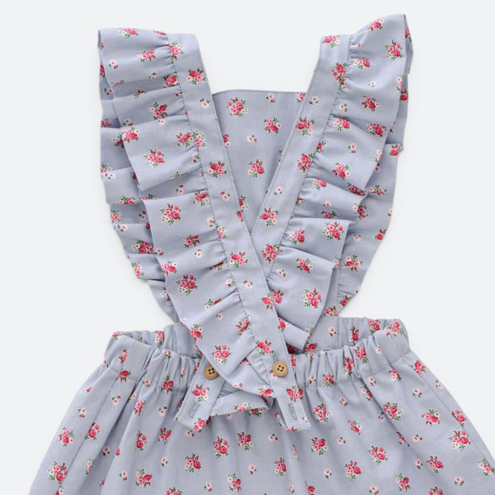 Latzkleid PDF Schnittmuster LIVIA – Rüschenkleid mit Trägern 68/74–116/122 in floral design with ruffles.