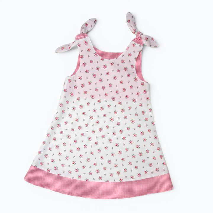Tunika Kleid pdf Schnittmuster JULE ANTONIA STEFFI – 3-in-1 74/80–146/152, rosa Blümchen Kleid mit Schleifen-Trägern.