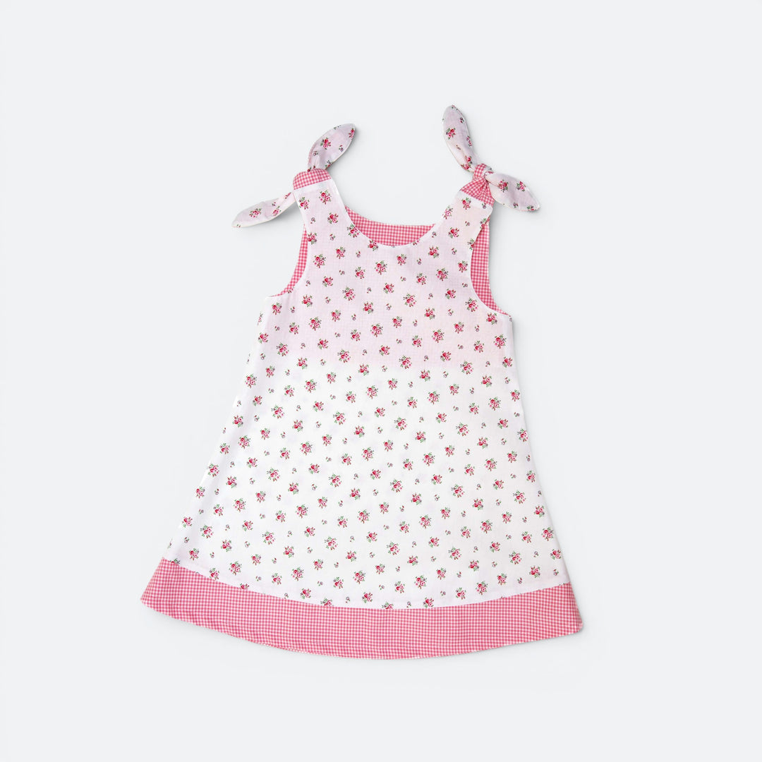 Tunika Kleid pdf Schnittmuster JULE ANTONIA STEFFI – 3-in-1 74/80–146/152 mit floralem Muster in Pink.