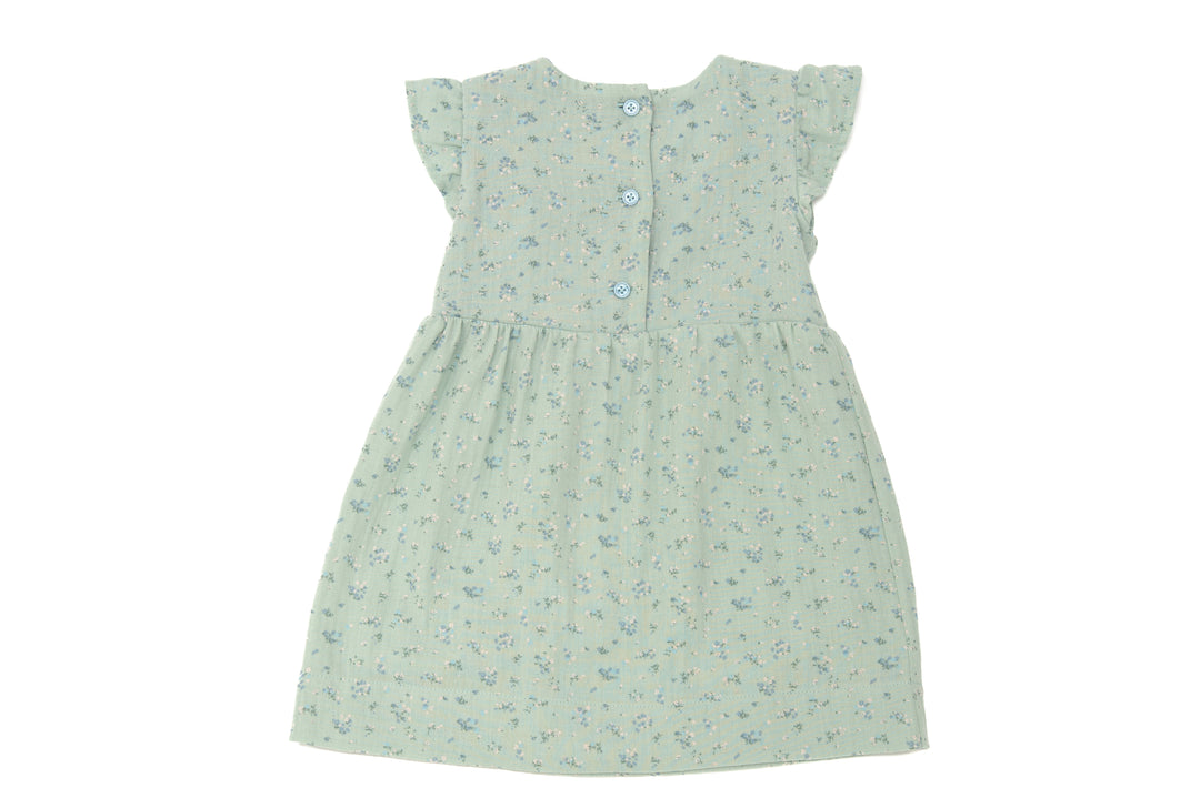 Schnittmuster Mädchenkleid ELLA – Retro Kleid mit Volants in sanftem Grün mit floralen Mustern und Knopfleiste.