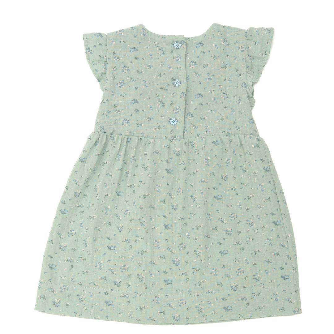 Schnittmuster Retro Kleid für Mädchen ELLA mit langen Ärmeln, florales Muster und Knöpfen auf der Rückseite.