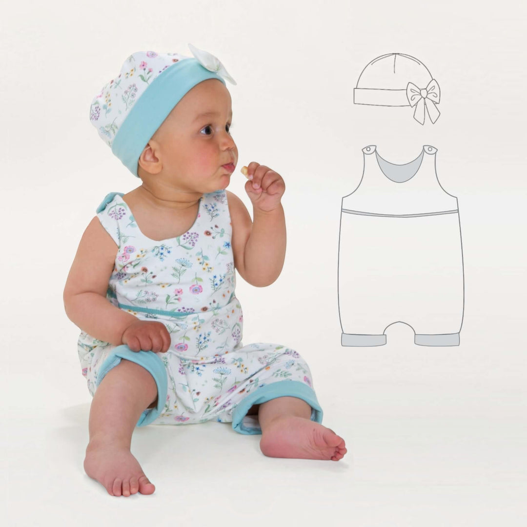 Baby Strampler PDF Schnittmuster DOLCE & Mütze MILA – Set 56/62–92/98, Baby in floral romper and matching hat.
