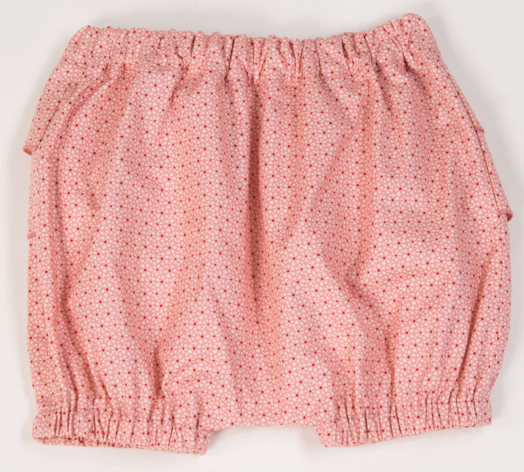 Schnittmuster Baby Twinset Babykleid Hängerchen und Pumphose CLARA EMI rosa Pumphose mit Rüschen im Bild
