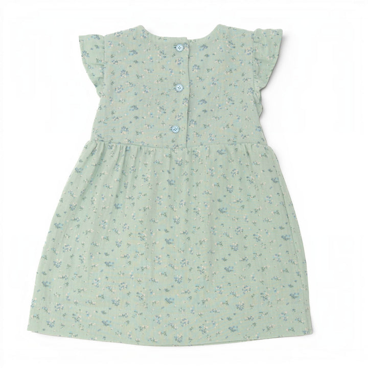 Schnittmuster Retro Kleid für Mädchen ELLA PDF - mintgrünes Kleid mit Flügelärmeln und Blumendruck, Rückseite mit Knöpfen