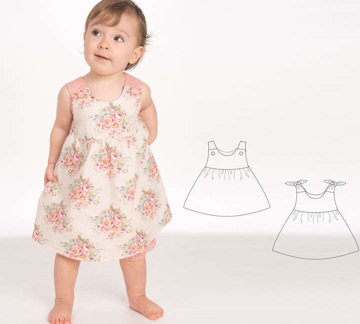 Schnittmuster Baby Twinset Babykleid Hängerchen und Pumphose, Modell A mit buntem Blumenmuster für Babys.