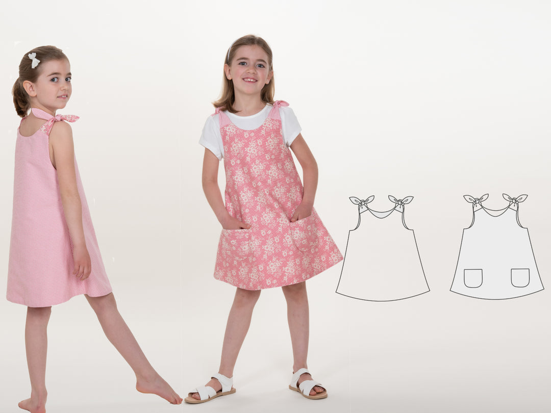 Schnittmuster Pinafore-Kleid für Mädchen JULE in rosa und gemustert, zeigt verschiedene Varianten und Designs.