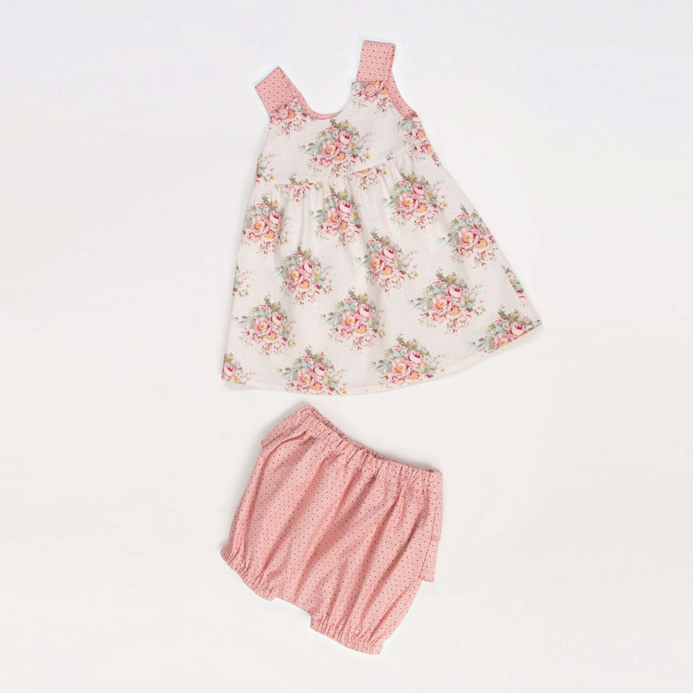 Patternforkids Baby-Twinset bestehend aus einem geblümten Kleid und einer rosa gepunkteten Pumphose aus Baumwolle