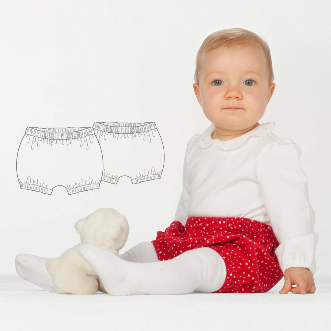 Baby Set PDF Schnittmuster BABY TWINSET – Trägerkleider & Pumphose 50/56–98/104, Baby im roten Rock mit gezeichneten Shorts.