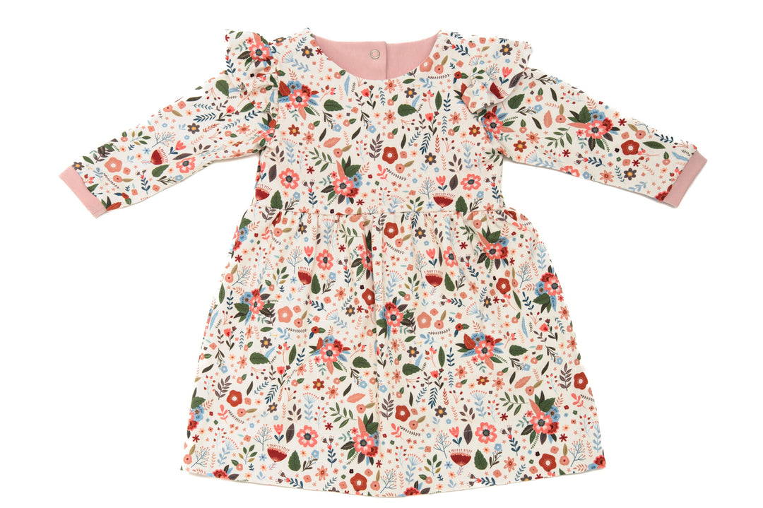 Schnittmuster Retro Kleid für Mädchen ELLA mit langen Ärmeln, blumiges Design und rüschen. Ideal für kleine Mädchen.